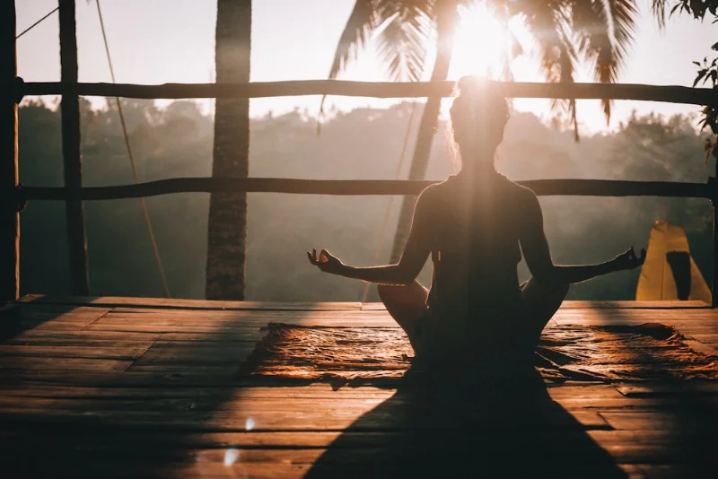 Holding Japa Mala correctly between thumb and middle finger without touching index finger